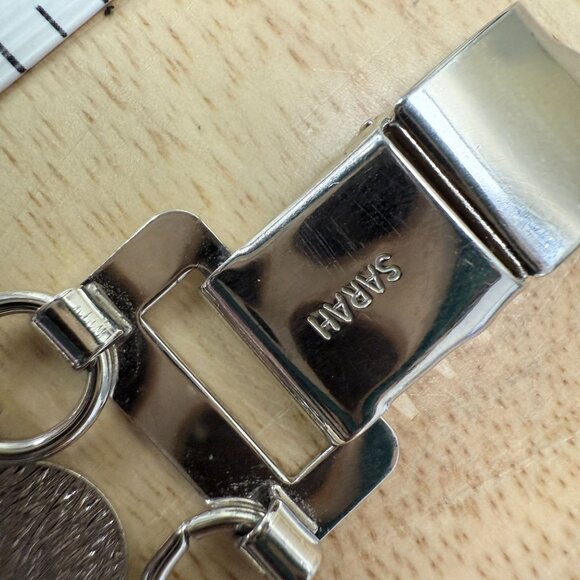 Sarah Coventry Silver-Tone Textured & Smooth Circle Link Bracelet With Fold-Over - Picture 14 of 14